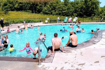 Children and adults enjoy the outdoor pool at Blue Mound State Park